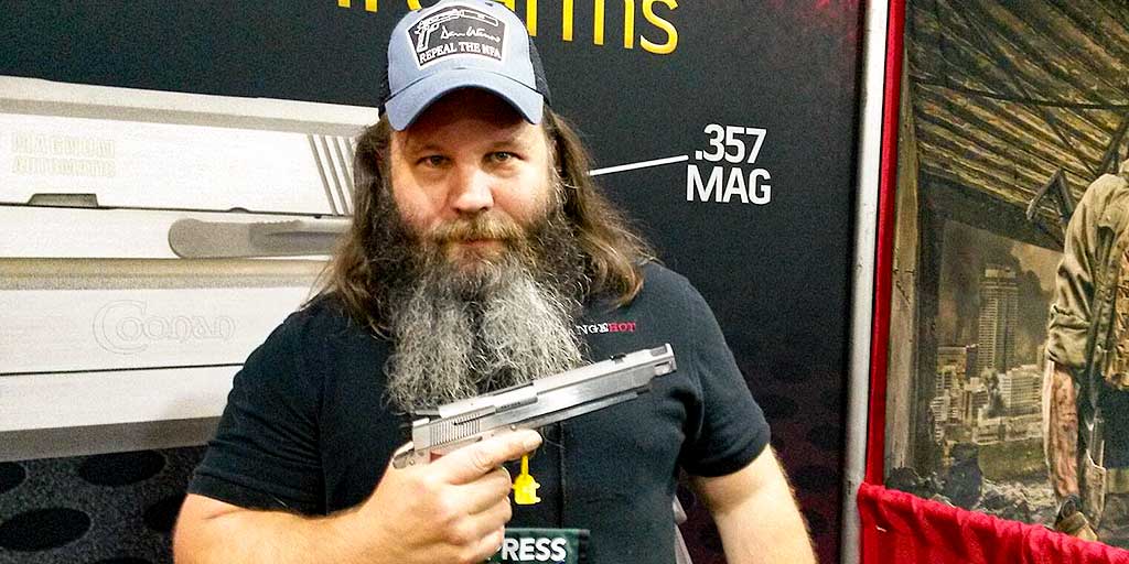 Coonaninc's tweet photo. #throwbackthursday to when Hunter Lee Elliot from @rangehot was in the Coonan booth at the 2017 NRA Annual Meetings! #NRAAM #NRA #coonaninc #rangehot #pistol #pewpew #guns #firearms https://t.co/Qnxgr5uokO