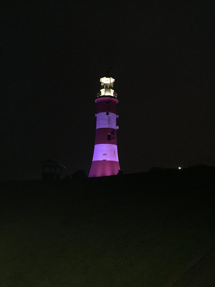 Here it is, Plymouth's iconic lighthouse,  Smeaton's Tower, being lit up in the colours of the suffragette flag, purple,  white and green. A fabulous end to Plymouth leg of the Flag Relay @XgovCentenary @SuffrageFlag  @FawcettPlymouth #suffrageflagrelay @NOW_Plym