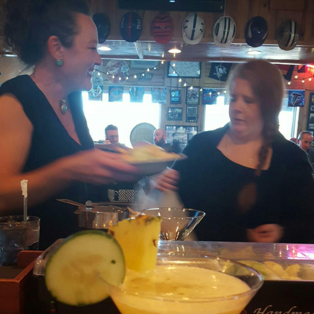 careyapplepi's tweet photo. Mo and Julie behind the bar for ladies night.... Cucumbers pineapple martini ... Yes pleas... @eatatricks @getStealz https://t.co/atTcThle2Z