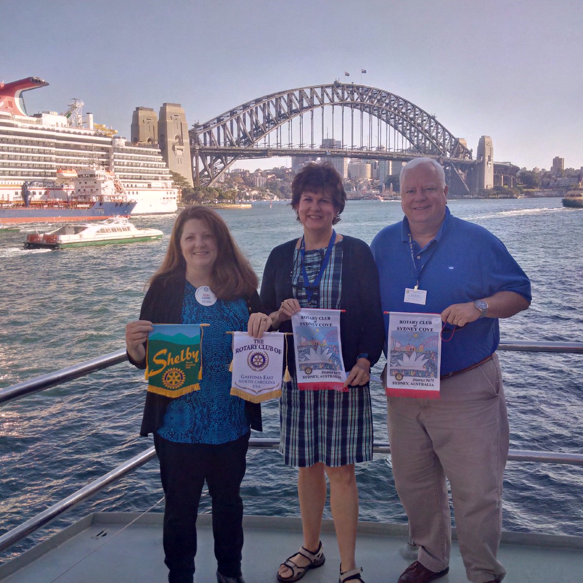 RotarySydCove's tweet photo. #rotary #exchangeofbanners on #theboatthatrocks with guests from NC in the US and our speaker today, Chris Wheeler. https://t.co/KtTPMREsTH