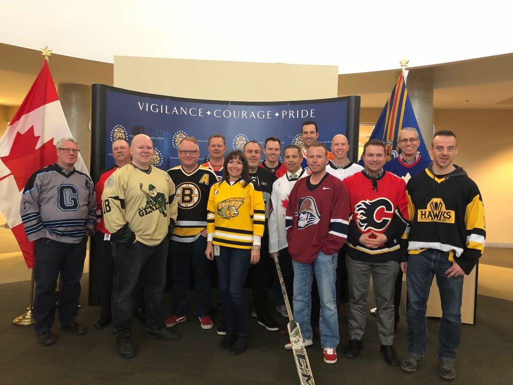 NancyHixt's tweet photo. As we all continue to think of those impacted by the Humboldt tragedy...I want to share a pic I was sent of some of Calgary’s finest (CPS homicide unit) @CalgaryPolice showing their support for #HumboldtStrong #Jerseysforhumboldt #PrayersForHumbolt https://t.co/XVjxVTTpsf