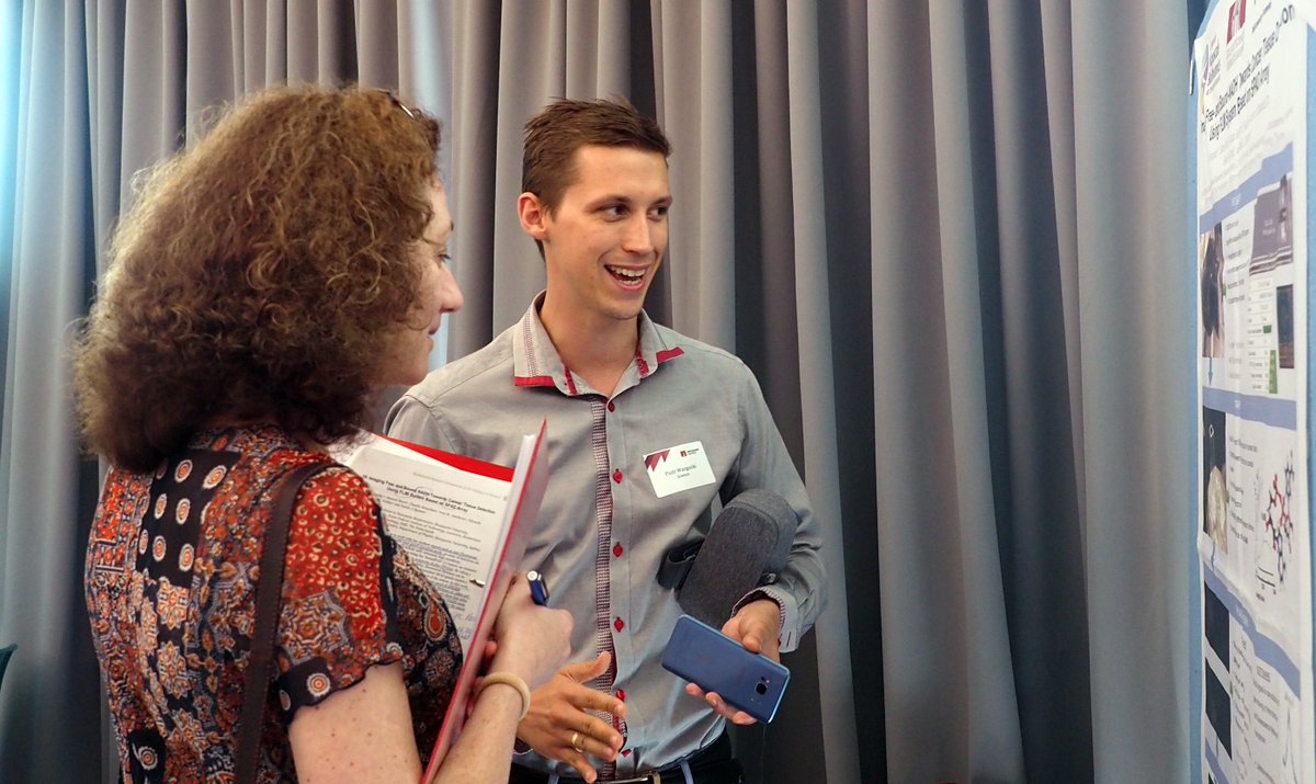 CNBPscience's tweet photo. #CNBP student Piotr Wargocki @Macquarie_Uni discussing his science during the poster session at #BioNetwork2018. #fluorescence #imaging #cancer #detection https://t.co/AOg10qJDAy