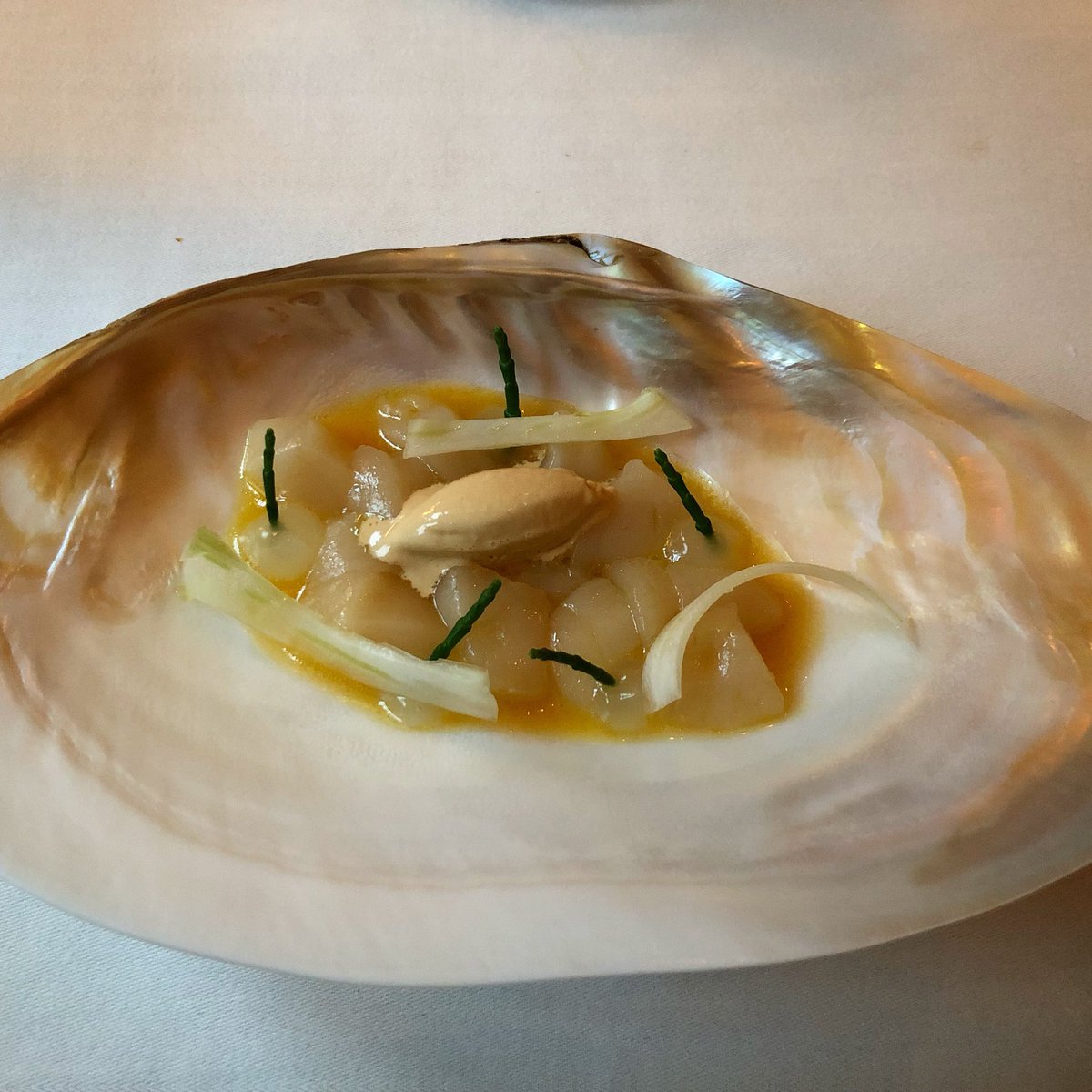 Orkney scallop tartare in clementine with an amazing sea urchin ice cream and fresh fennel by <a href="/ArnaudBignon1/">Arnaud Bignon</a> <a href="/greenhouse27a/">The Greenhouse</a> #michelin