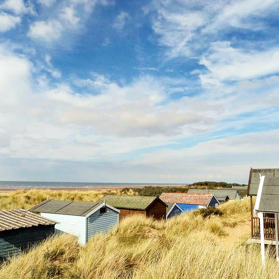 I love the way the beach huts at Old Hunstanton are hiding shyly in the dunes. #beachhuts #norfolkcoast #mynorfolk #niptonorthnorfolk #sunnyhunny #oldhunstanton #beachhutsoftwitter