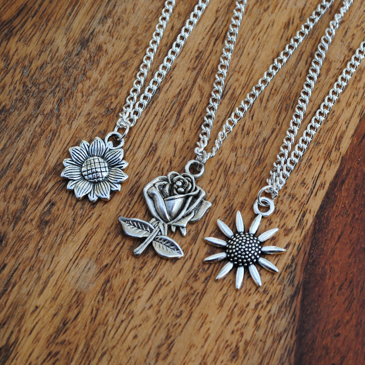 losttothePoppy's tweet photo. Sunflower, Rose &amp; Daisy Tibetan Silver Charm Necklaces available for £4 each or get all three at the discounted price of £10 🌻🌹🌼 https://t.co/nHY41JytAu 🌼🌹🌻 https://t.co/lDnM6hSr3a