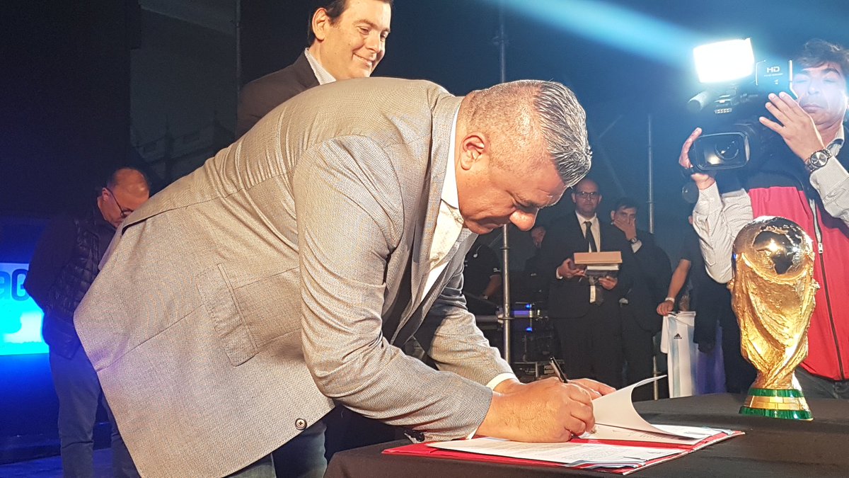 afa's tweet photo. El Presidente Claudio Tapia firmó el acuerdo de colaboración por el estadio Único de Santiago del Estero junto al Gdor. Gerardo Zamora. https://t.co/I5uYlSDPeI