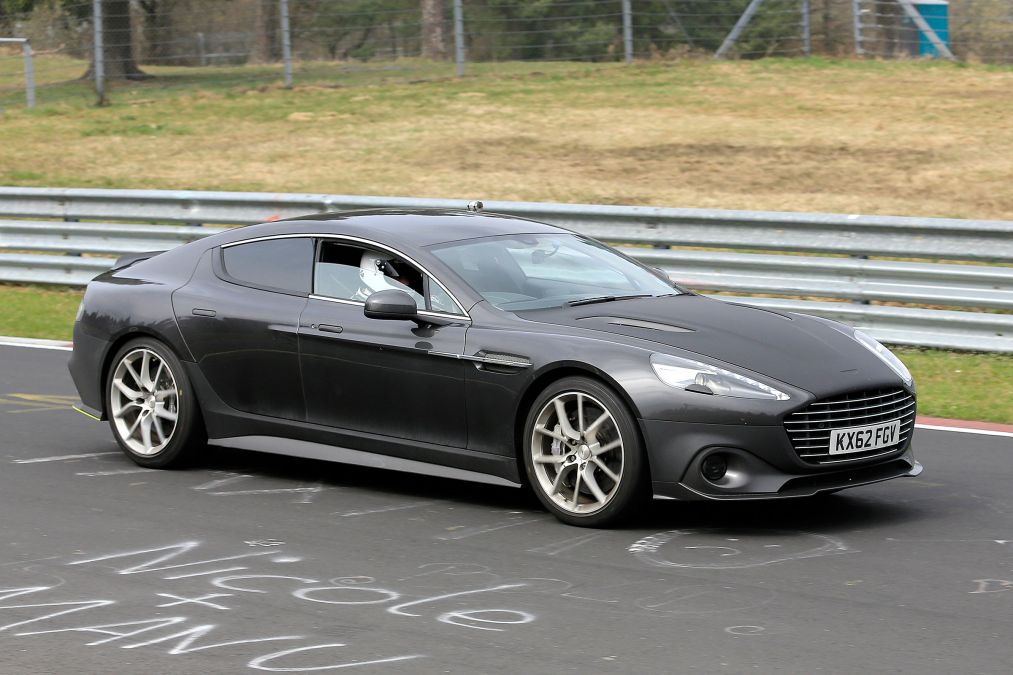 evomagazine's tweet photo. The production version of @Aston Martin's Rapide @AMR_Official has been spotted testing at the Ring - https://t.co/v3Stznrn5R https://t.co/rPhRxY6ceY