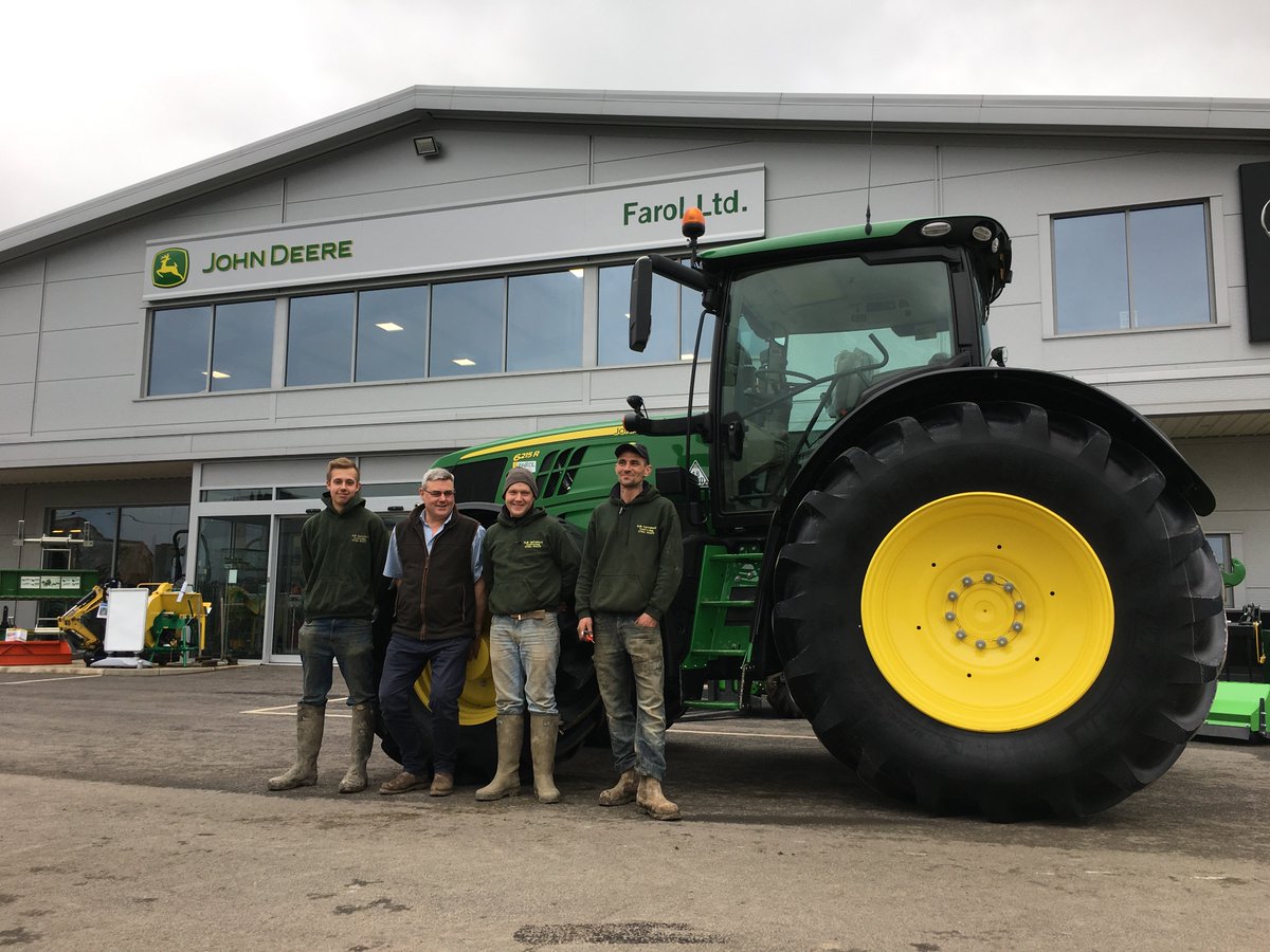 FarolLtd's tweet photo. Salesman John Bennetts (2nd left) handing over another John Deere 6215R to the crew from RJR Contracting, adding to their fleet of Farol supplied machinery for the 2018 season! #Grass18 #Harvest18 #NewKit https://t.co/7uo8zDS1nc
