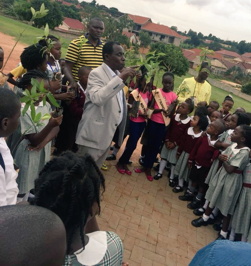 JosephMasembe1's tweet photo. Ahead of the Climate change conference i planted a tree with among others princess Musimenta who is a compund prefect at Kampala Academy. #GoGreenUg #ICCCC18 https://t.co/7tPOpqBQVa