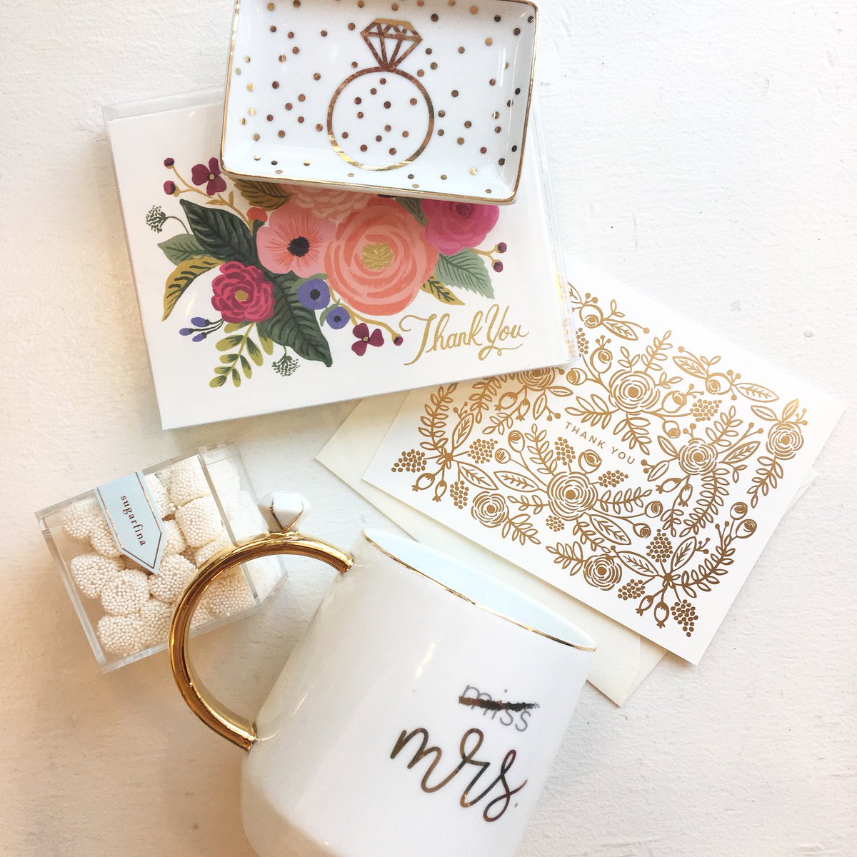 New bride essentials! ⤵️ Can’t you just imagine 💭🥂💕
•
<a href="/sugarfina/">Sugarfina</a> <a href="/rosannainc/">rosannainc</a> <a href="/RiflePaperCo/">Rifle Paper Co.</a> • #misstomrs #putaringonit #feyoncé #cards #thankyounotes #brideessentials #essential #champagne #bubbles #imagine #coffee #tea #cutemug #bridemug #bridalshower #newlyweds #honeymoon