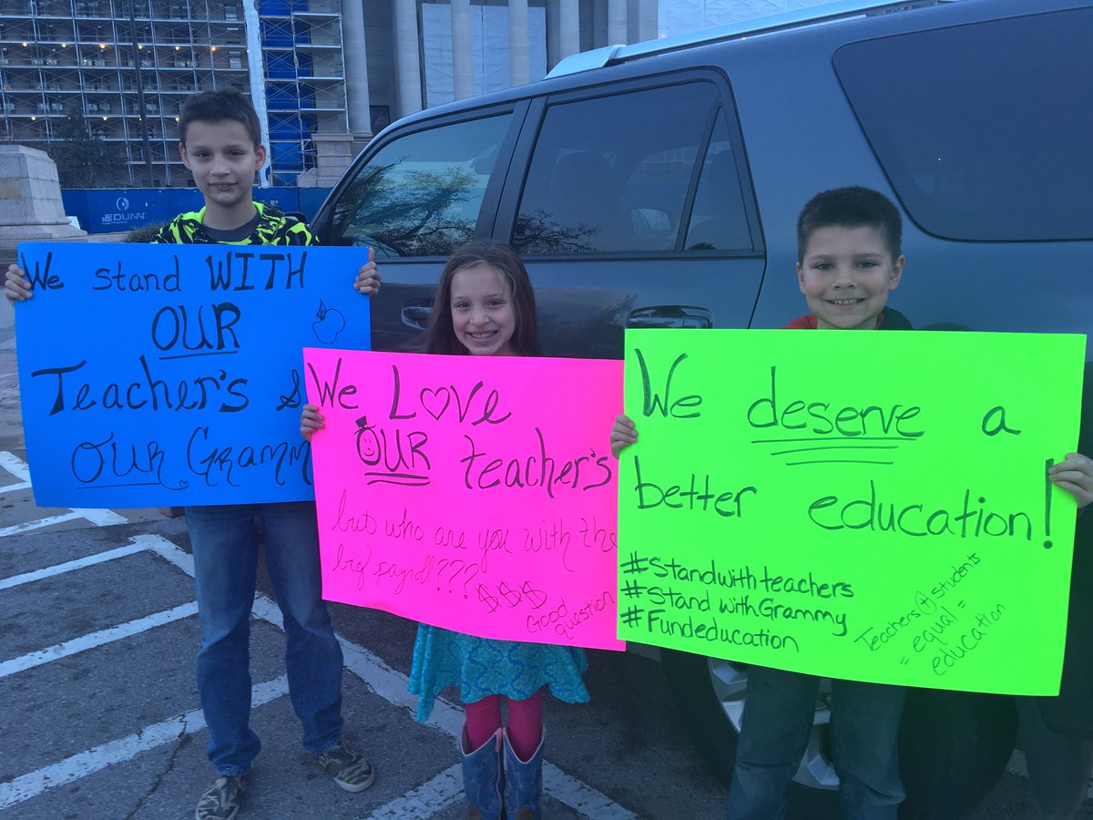 ShardaaGrayTV's tweet photo. This grandmother, who’s also a teacher at Roger Middle School, brought her grandkids out to continue the #OklahomaTeachersWalkout despite OEA saying it’s over. #WalkoutWatch https://t.co/uc8aBMAL2p
