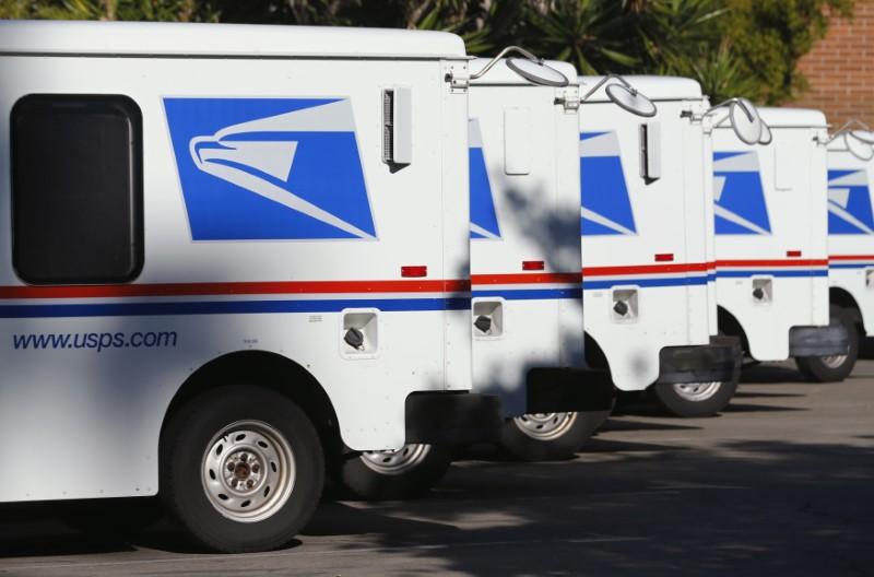Reuters's tweet photo. Trump orders review of U.S. Postal Service following criticism of Amazon https://t.co/WWR10N3wvK https://t.co/iL4eVhmnbR