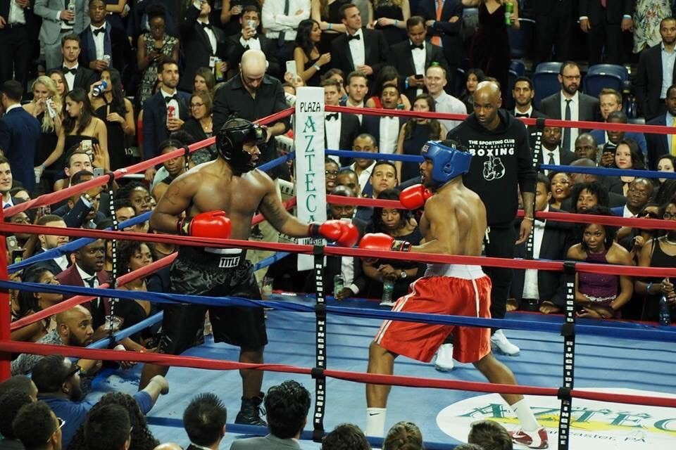 ToigoFoundation's tweet photo. That's #ToigoFellow Jock Payten on the left en route to victory in the annual @Wharton #MBA vs @PennLaw  boxing match! He’s headed to @EatonVance after graduation. This fight night is 14yr @Penn tradition. https://t.co/BntBzJWeX4