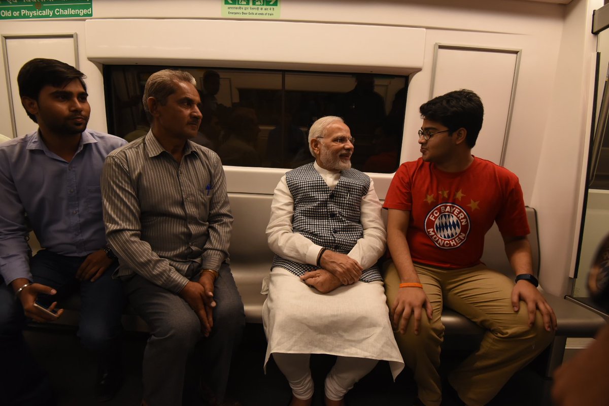 PMOIndia's tweet photo. Earlier today, PM @narendramodi travelled to Dr. Babasaheb Ambedkar National Memorial and back by the Delhi Metro. Here are some glimpses. https://t.co/km0IwlUlOj