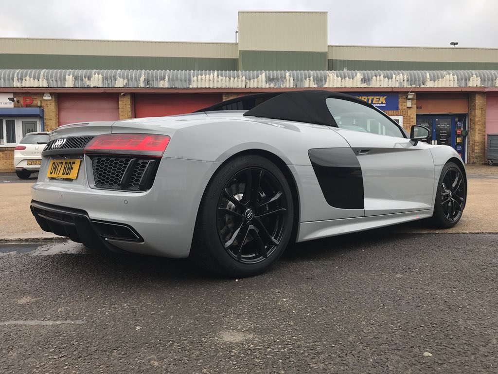 #R8 Spyder wrapped in nardo grey including door shuts. Wheels powder coated gloss black