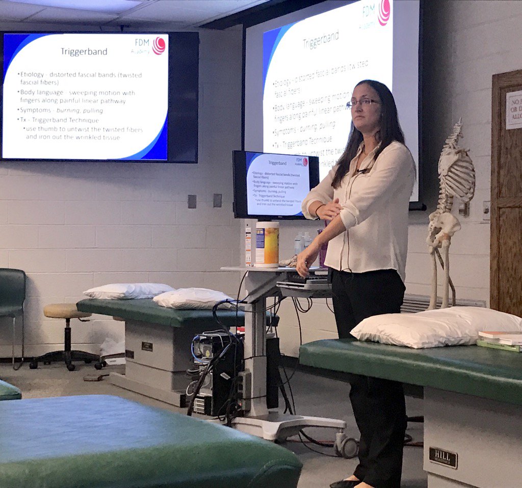 USAFDM's tweet photo. Jen Ribar, DO, introducing the concept of Triggerbands within the Fascial Distortion Model at Michigan State COM. https://t.co/YYmlKKiEQ4