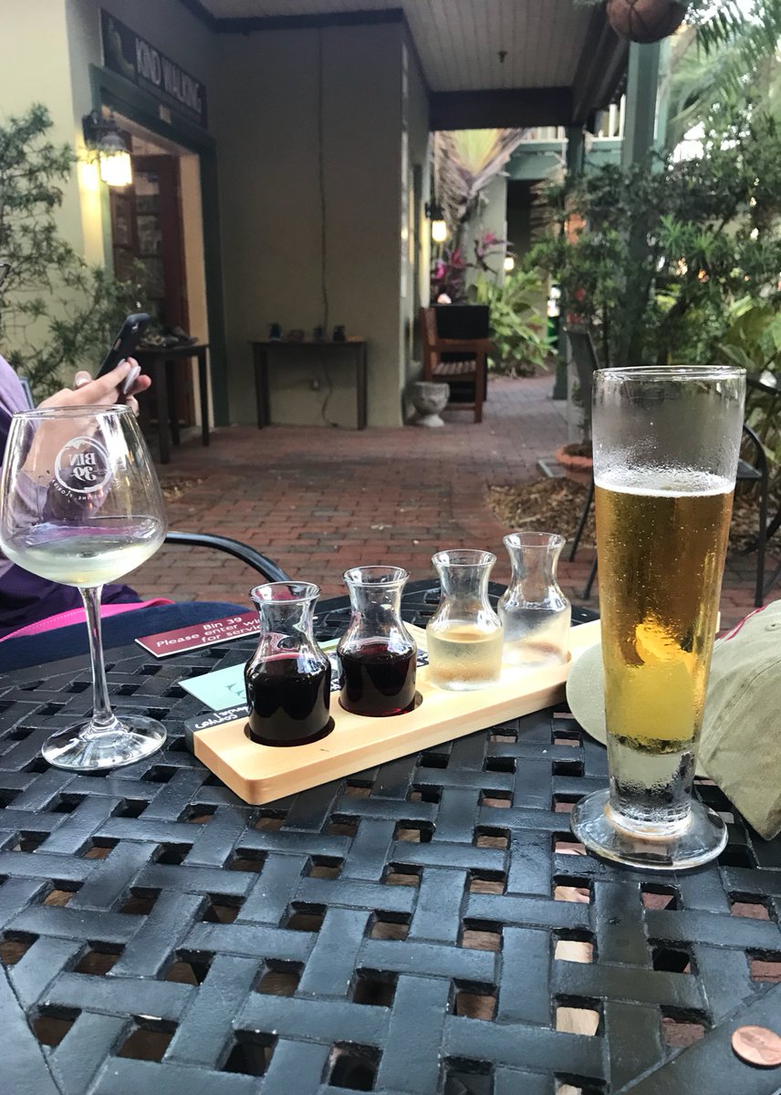 Time2Gtfo's tweet photo. Out with my wife @PSYCHedRN and the woofs @sascha_fierce and #Kokonut at #bin39 in the #StGeorgeInn in #StAugustine. She got a nice #wine flight and I got a @StellaArtois. A great decompression after a long work week https://t.co/JKR3OxE5oU