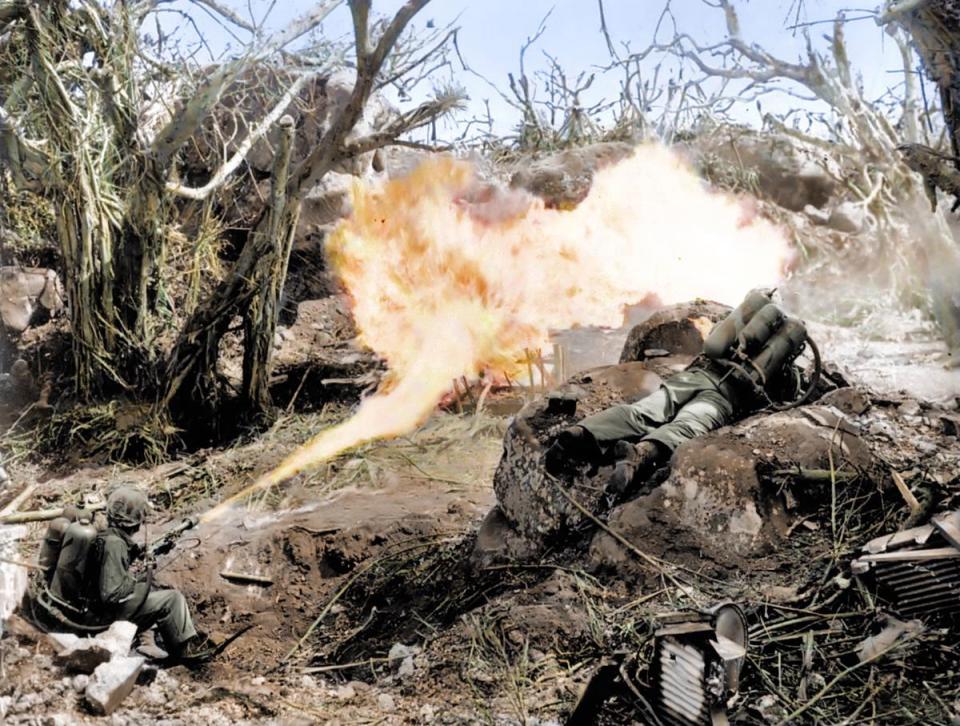BarbaraPAuthor's tweet image. 1945: Marines torch a Japanese defensive in Iwo Jima’s Mount Suribachi by using flamethrowers. These military tools were an effective weapon for burning out entrenched fighters who would have otherwise continued to fight, costing more lives. #WW2 #IwoJima #Flamethrowers #Japanese