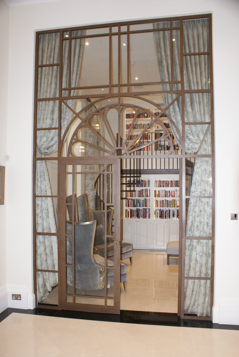 ForgingMatters's tweet image. Curved frame and doors in steel and glass.