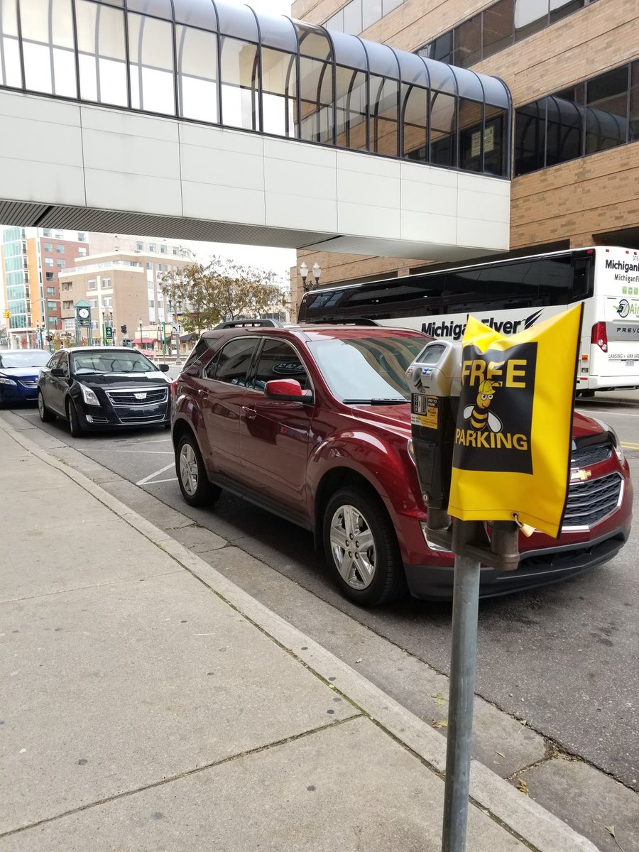 CityofEL's tweet photo. Find the Bee, Park for Free today in @DowntownEL! If you find a free parking meter bag sporting our friendly #ELBUZZ bee mascot, you can park for free! 

Thank you for continuing to support downtown businesses during the Center City District construction. #EastLansing 🐝 https://t.co/xqmJ9QoiDe