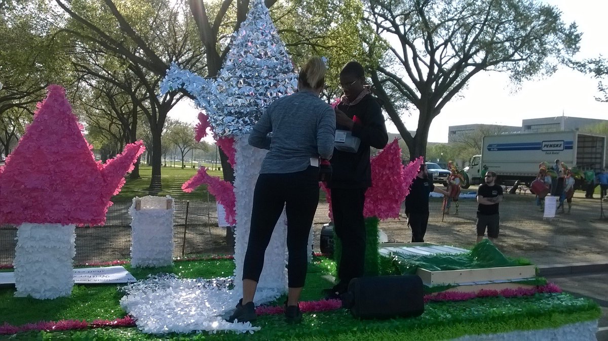 HillCenterDC's tweet photo. Enjoying the beautiful weather &amp; getting ready to spread an important message with our @CherryBlossFest @emancipationdc parade floats, designed by @GoDCPhelpsHS students! #DCEmancipationDay #firstfreed https://t.co/L84R8o6z85