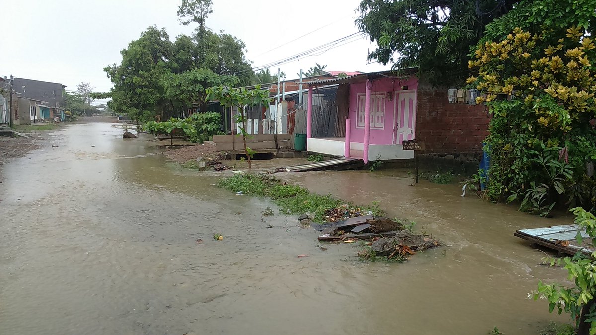 Mangle_Blanco's tweet photo. Heading to the rural area to share humanitarian maps with fishermen at El Uno. This is the landscape in #Turbo downtown after heavy rains last night and counting. #COASTMAP #Urabá #LaNiña @hotosm #Microgrant https://t.co/WL7kNEr6Y6
