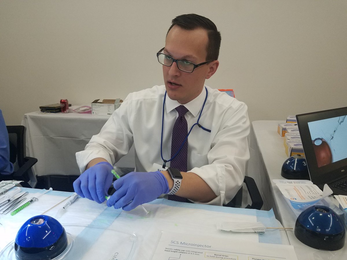 RetinaToday's tweet photo. Nathan Fisher of @clearsidebio briefs fellows at #DukefAVS2018 on the suprachoroidal injection of triamcinolone. @dukeeyecenter https://t.co/ic3eXzewIe