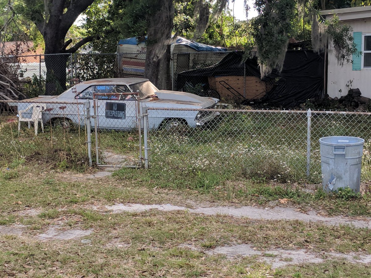 NRCOnAir's tweet photo. On a warm Florida Eve, you can hear a ChevyII quietly rusting in the grass.@barnfinds @B_Classic_Cars @grm_mag @AmericanCCMag #junkchevy #Fordrules #musclecars #chevysblow #streetracer @LenosGarage @GasMonkeyGarage @SkidmarksShow @ShiftSteerMedia https://t.co/YTg1k89bC9