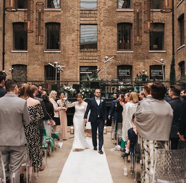 DevTerrace's tweet image. Throwback to our gorgeous #Easterwedding on our all weather terrace. How happy does Rachael look to be walking down the aisle! @pearbearphotography 
who's at the #nationalweddingshow today? Come and see us at stand G40. #weddingsaturday @TheWeddingShow_