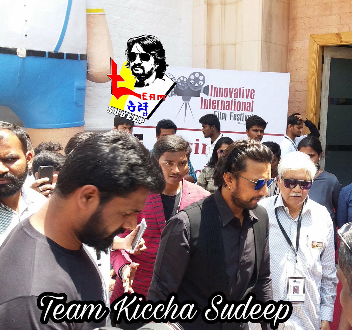 TeamKiccha's tweet photo. Dynamic Entry Of Bigg Boss Kiccha Sudeep 👑

#InnovativeInternationalFilmFestival #IIFF 2018 

@KicchaSudeep @iampriya06
 @IIFFBengaluru @ColorsSuper @Cleartrip @IsraelBangalore https://t.co/FUWU2cAPBs