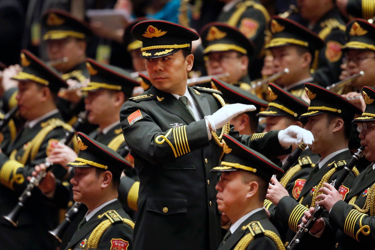 Bandazia's tweet photo. The Military Band of Peoples Liberation Army (PLA) of China plays at the inaugural session of the National Peoples Congress at Great Hall of the People, in Beijing, on 5 March 2018. The NPC reelected President Xi Jinping for another term and abolished term limits for him. https://t.co/iZMoyBYUYA