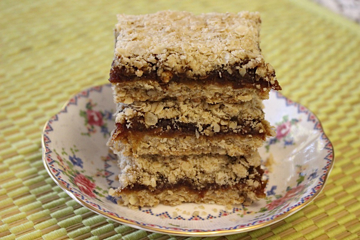 Bro_Baking's tweet photo. One theory behind why Manitobans call date squares "Matrimonial Cake" is because they're 'two parties held together by dates.'

If you're from the prairies, it's knowing how to make a these wholesome, toasty squares is pretty much mandatory.  

https://t.co/Bo0QxaksUA https://t.co/i7tEDbrjxJ