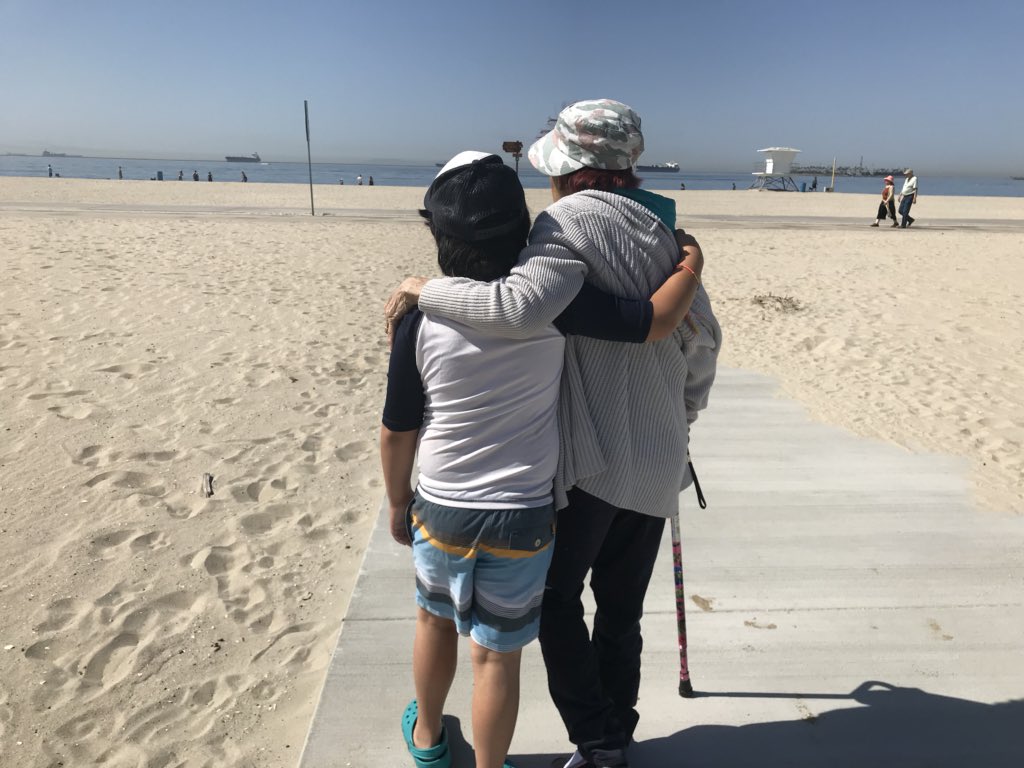 davidmartinez's tweet photo. @mwtaylor @rogerhoward I’m crazy hard on my kids but love them to pieces, and I’m present! It’s the values we pass on that are key... my son helping Grandma get to Rosie’s Dog Beach FTW! https://t.co/WZaNIaZq5c