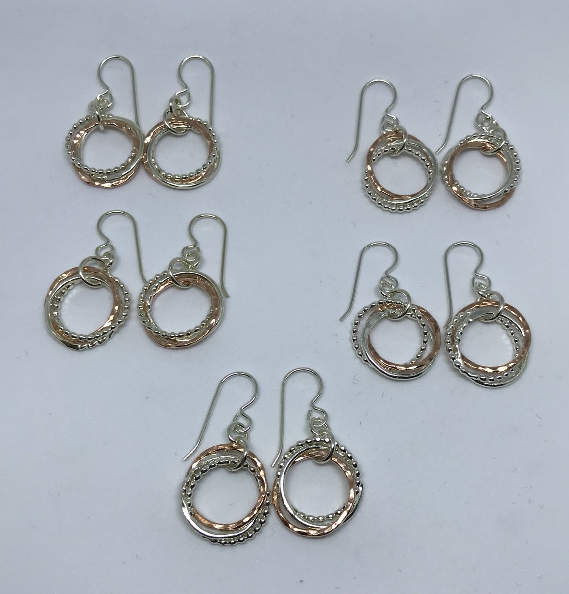 EllJay_Design's tweet photo. 5 pairs of textured silver & copper earrings done. Moving on to pendants and rings now. Finally using some of my labradorite. :) #elljaydesign #yqr #custom #jewellery #silver #shoplocal #labradorite https://t.co/ynjdjbDZxX