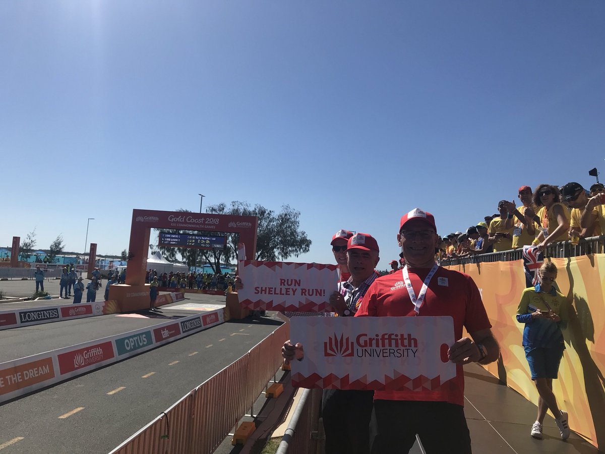 Phillip_stork's tweet image. Congratulations @Griffith_Uni grad @MShelley42km. #TeamGriffith very proud of you. @GriffithUniVC, @martinbetts and Prof Michael Powell cheering you across the finish line @GC2018