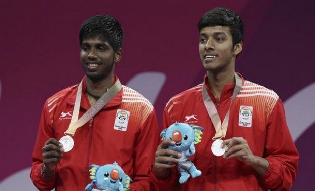 Vijay_Rules_Da's tweet photo. #TeamIndia🇮🇳 @ #GC2018 Final Day Updates!
#GC2018Badminton :
#SainaNehwal wins Gold & #PVSindhu wins Silver
#SrikanthKidambi Wins Silver
#Rankireddy & #ChiragShetty wins silver
#GCSquash :
#DipikaPallikal & #JoshnaChinappa wins silver https://t.co/ZCBAYvrpu4
