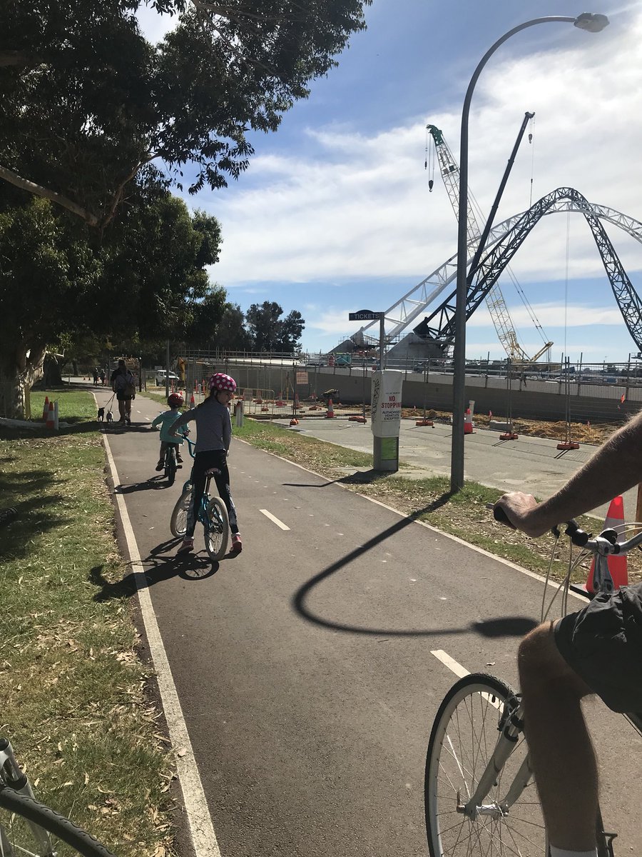 EngAustraliaWA's tweet photo. Perfect Perth day to take the bike out round the river and capture some construction pics of the bridge @OptusStadium #engineeringnerd https://t.co/WPTxWlk0Eg