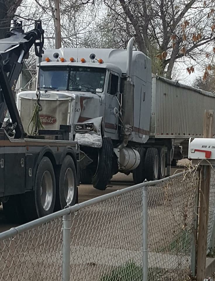 EmilyAReports's tweet photo. Morgan County Sheriff says the man driving this stolen semi nearly killed multiple people last night — plowing into law enforcement cars and people driving along the road. In total, 10 cars were damaged and 5 people were injured during the pursuit. #KDVR https://t.co/eszDrCCjDz