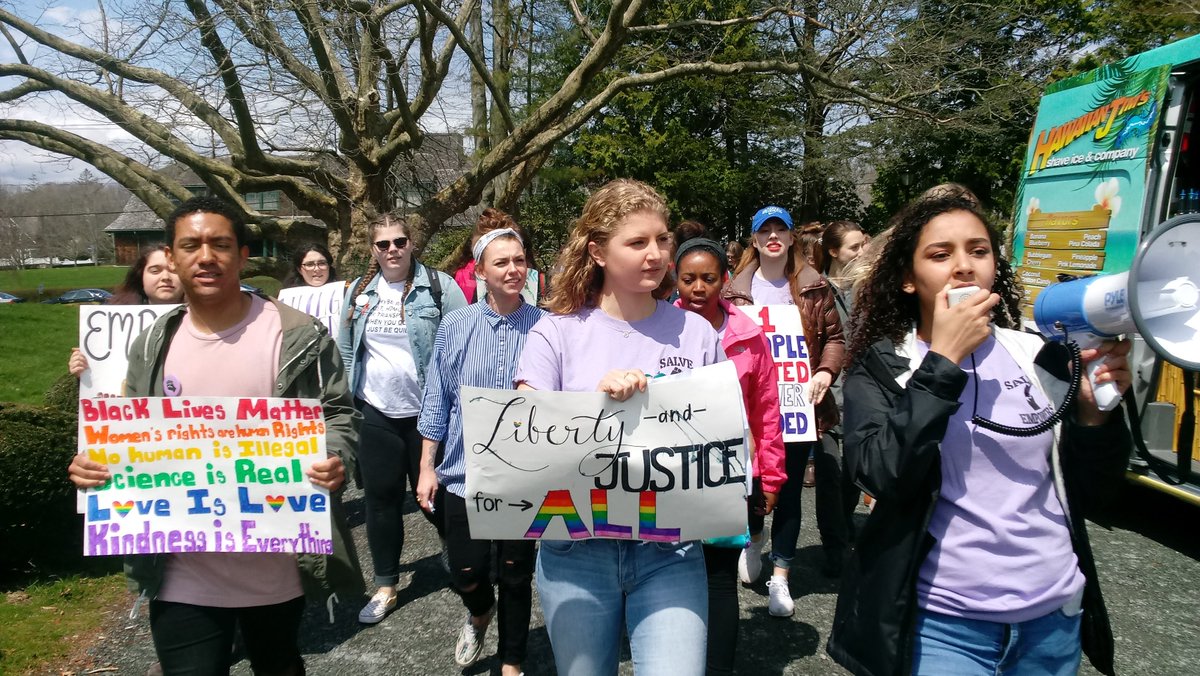 SalveRegina's tweet photo. Did someone say rain? A little rain couldn't stop the #EmpowermentMarch led by our amazing student clubs! #SalveEmpowers And then, on cue, the sun came out! https://t.co/hNFEkhH4oN