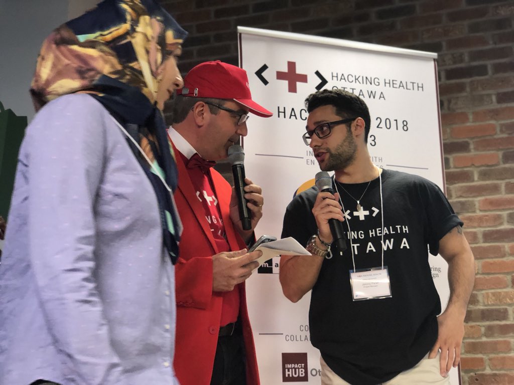 iliasb's tweet photo. Negotiating for @lsirois007 blazer and it’s sweet touch at #HIP613! Didn’t realize @HHOttawa was training their #hackathon participants on such skills! https://t.co/y7b00ZQnjV