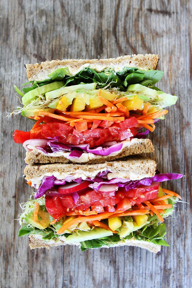 How wonderfully #colorful is this #rainbow #sandwich? It's even made with lots of #veggies, so it's #healthy too! ~JMK