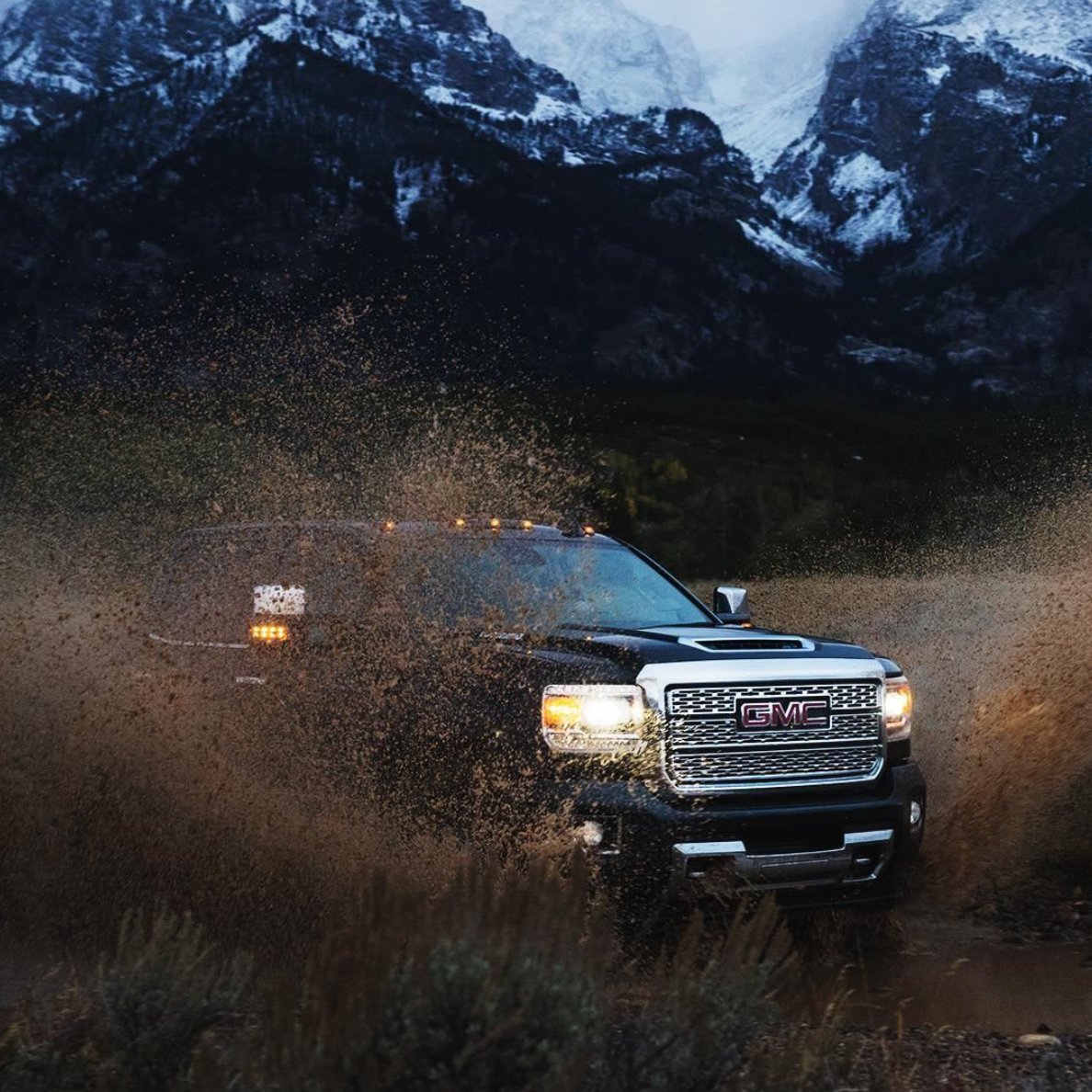 SSBuickGMC's tweet photo. It’s true: mud baths can be therapeutic. Make a splash #LikeAPro in the #GMCSierra #Denali HD. https://t.co/6673sooQdj