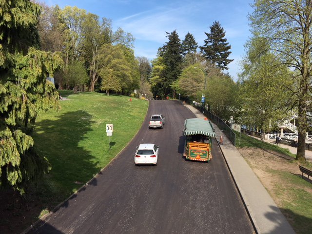 ParkBoard's tweet photo. Stanley Park Drive is now open ... and better than ever! The section between the totem poles and Lumberman's Arch was repaved. https://t.co/5J5OIxF3pv
