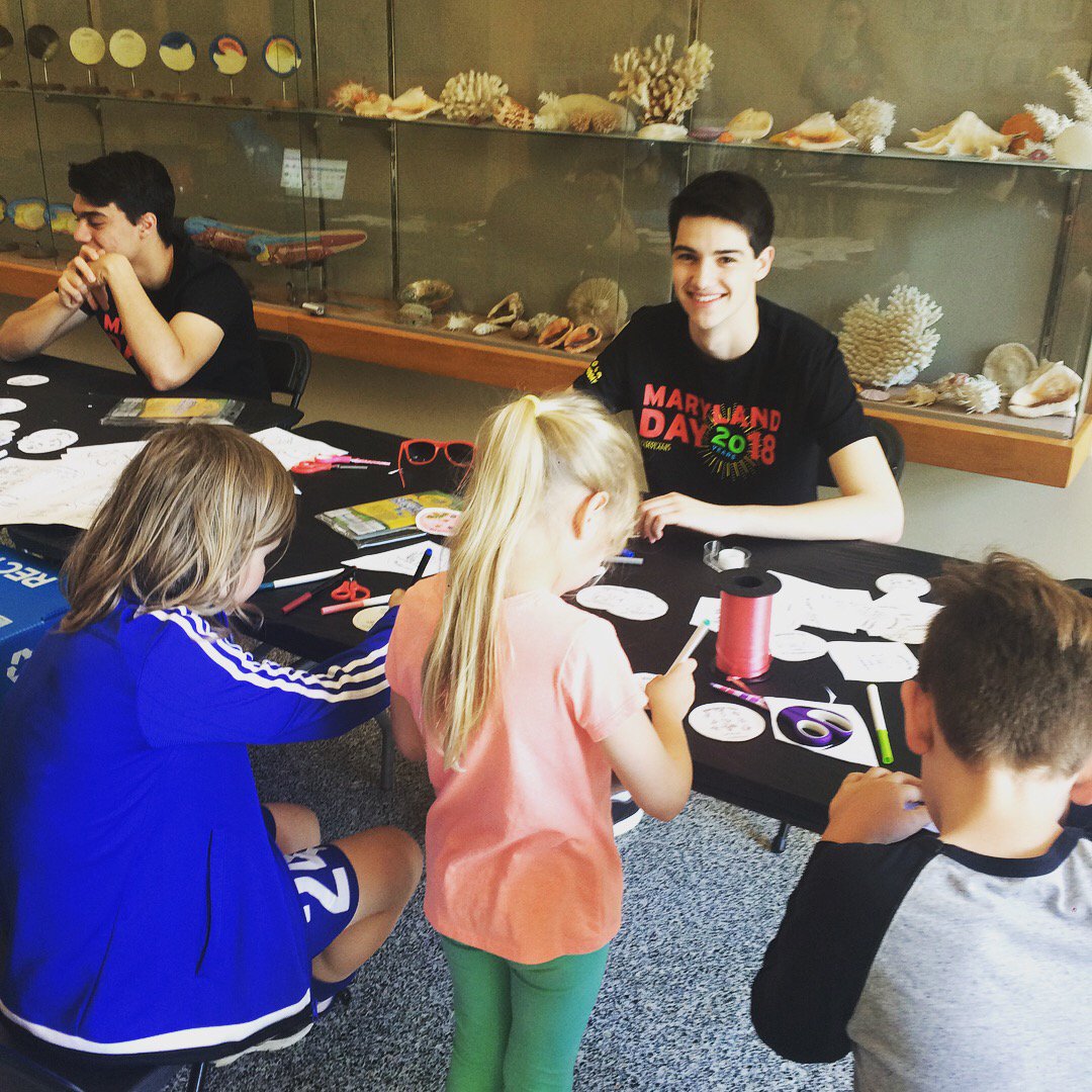 UMDASM's tweet image. We celebrated 20 years of #MarylandDay by making microbe madness buttons!