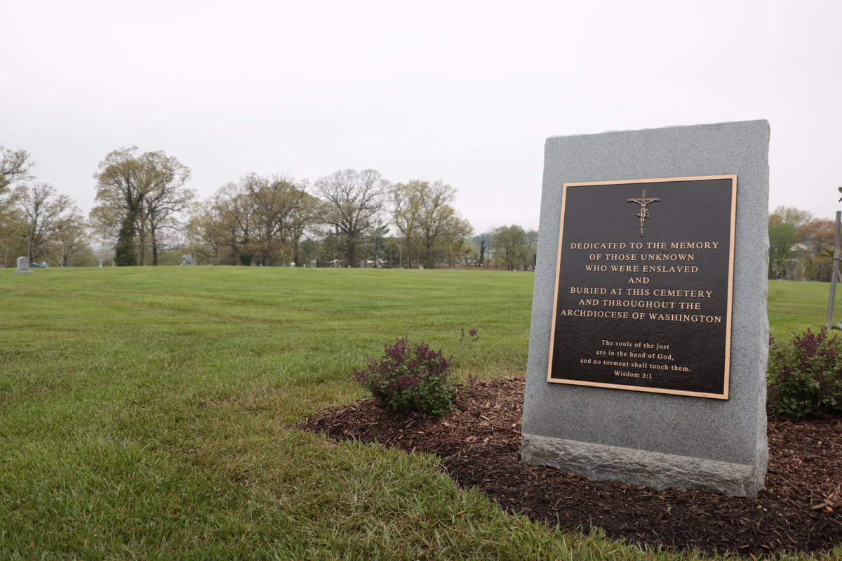 WashArchdiocese's tweet photo. Follow along this morning as we dedicate the memorial for the enslaved men and women buried at Mount Olivet Cemetery. #UnityinDialogue https://t.co/ZxMq2Re1V7