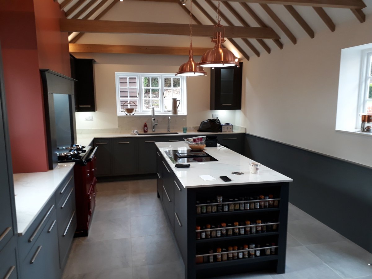 English Revival kitchen with @Dekton Tundra gloss worktops compliment each other with stunning Copper pendants from @LeytonLighting all fitted by the team @Stortfordkitch1