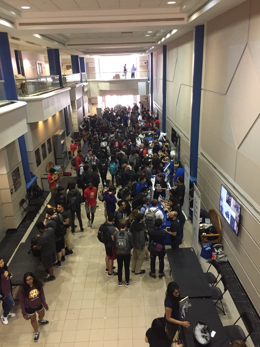 hackumbc's tweet photo. ENG Atrium is packed with students talking to sponsors!! #hackumbcs18 https://t.co/W07vEtVibh