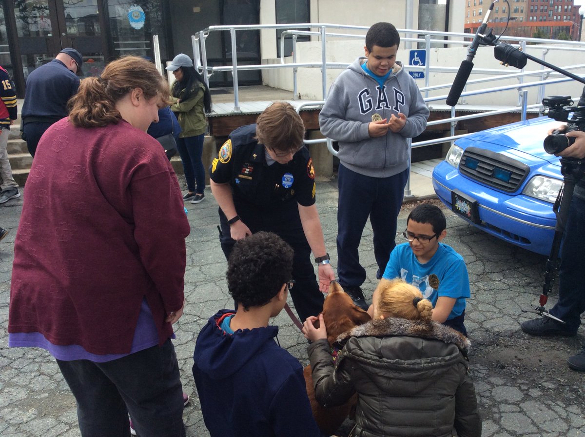 lawrencepolice's tweet photo. Sgt. Sandy Picard and Oliver greeting guests at the Lawrence Police Department's Autism Awareness Open House. Chief Roy Vasque and Members of the Department welcomed students from Greater Lawrence area to the station #lawrencepolice #PolTwt https://t.co/J0daHuV525