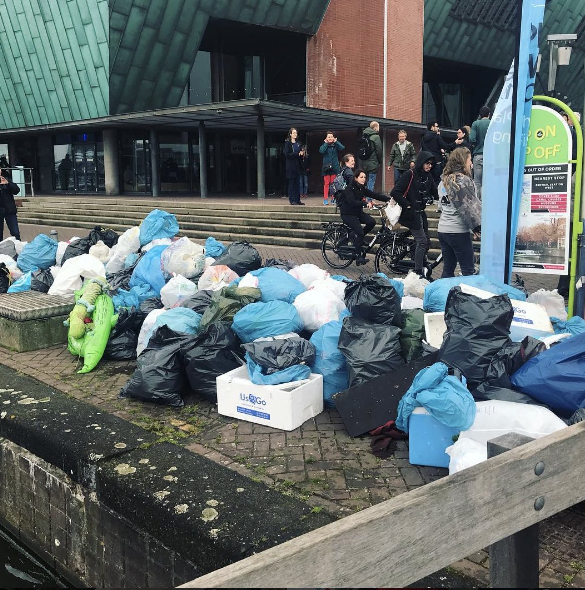 Mokumboot's tweet photo. he Kingsday aftermath... 200+ people went out fishing for plastic on the Amsterdam canals. We're very happy to support this @plasticwhale event and its volunteers. Great work everyone, thank you!! https://t.co/FaX12qwUGG