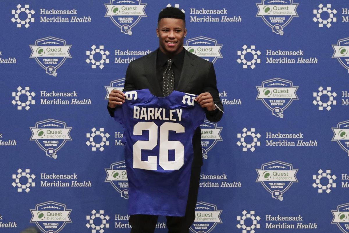 NYDNSports's tweet photo. Saquon Barkley’s NFL journey began with family moving from New York for a better life, now he’s back to make them and Giants proud - @jphealy 
https://t.co/Ixhrfj5k3e https://t.co/QyP9TZk8q7